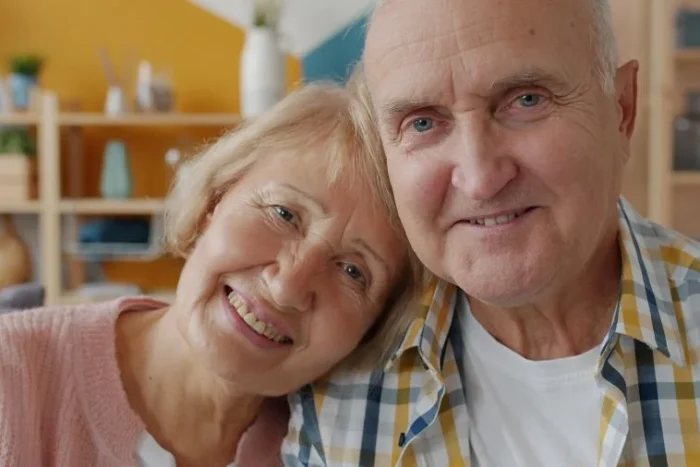 Older couple discussing healthcare savings and planning for future medical expenses together